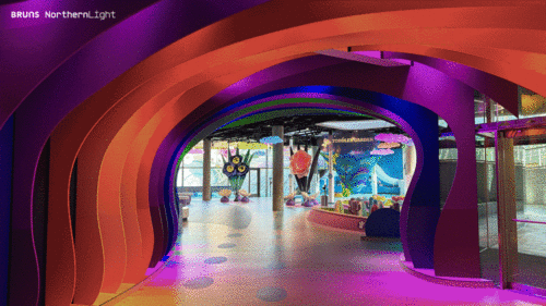 Children exploring colorful interactive exhibits at the Moody Family Children’s Museum designed by Bruns + NorthernLight.