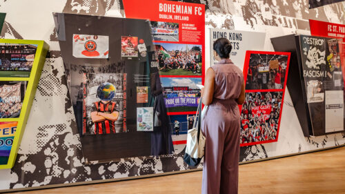 Visitor views Cooper Carry’s soccer and human rights exhibition at the National Center for Civil and Human Rights in Atlanta.