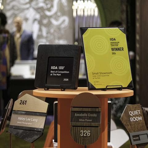 Takeform NeoCon showroom with immersive department store-inspired experiential graphic design.